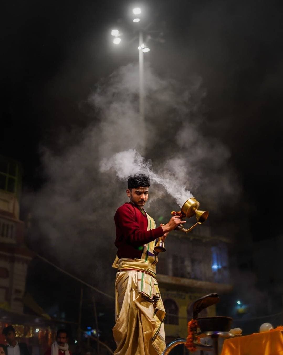 Ganga Aarti Ceremony with priests holding fire lamps